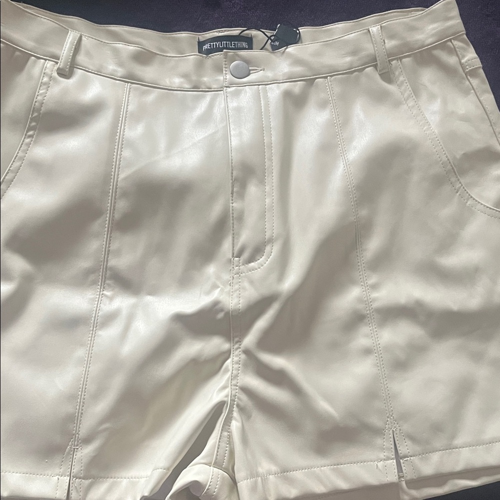 PrettyLittleThing Cream High-Waist Faux Leather Shorts with Belt Loops